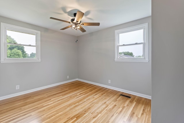 1025 Goshentown Rd, Hendersonville, TN 37075 - unfurnished room with baseboards, healthy amount of natural light, a ceiling fan, and wood finished floors