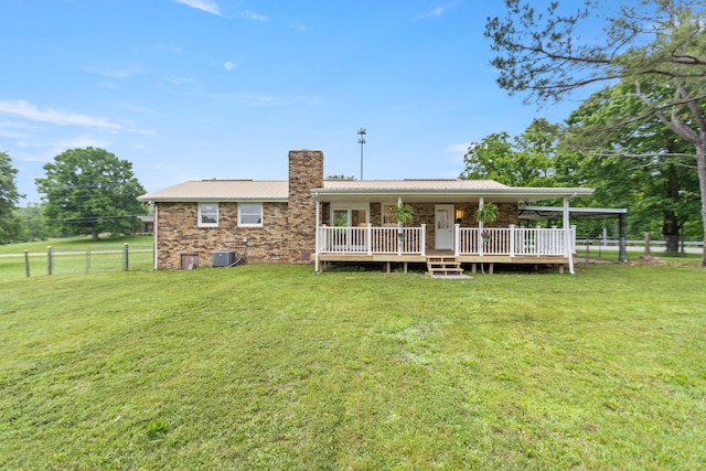1025 Goshentown Rd, Hendersonville, TN 37075 - back of property with a chimney, cooling unit, and metal roof