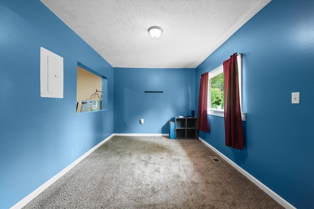 111 Stacker Dr, Clarksville, TN 37040 - carpeted spare room with baseboards, electric panel, a textured ceiling, and visible vents