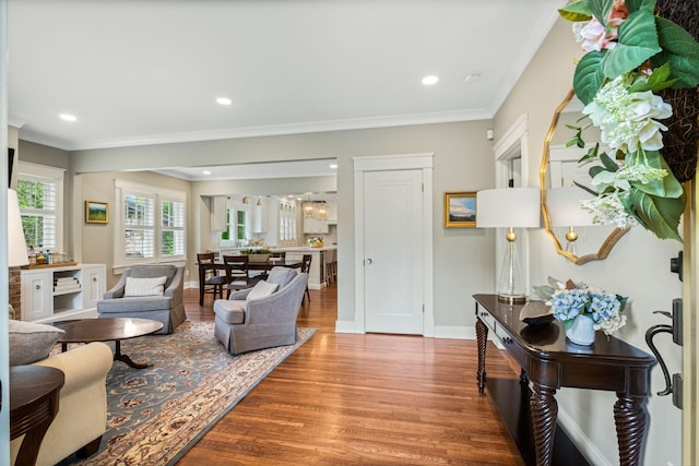 2004 Natchez Trce, Nashville, TN 37212 - living room with crown molding, recessed lighting, baseboards, and wood finished floors