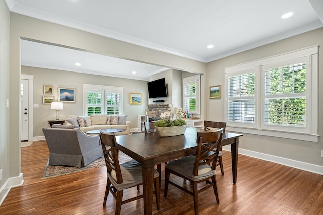 2004 Natchez Trce, Nashville, TN 37212 - dining area featuring crown molding, baseboards, recessed lighting, and wood finished floors