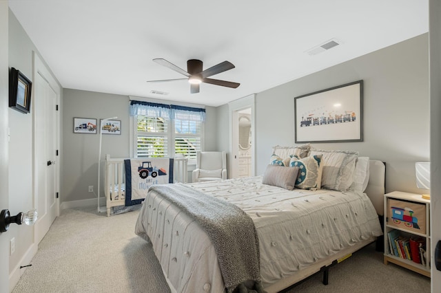 2004 Natchez Trce, Nashville, TN 37212 - bedroom featuring visible vents, a ceiling fan, baseboards, and light carpet