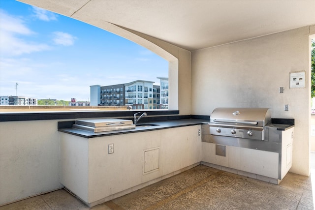 1510 Demonbreun St Unit 807, Nashville, TN 37203 - view of patio featuring a view of city, a sink, grilling area, and an outdoor kitchen
