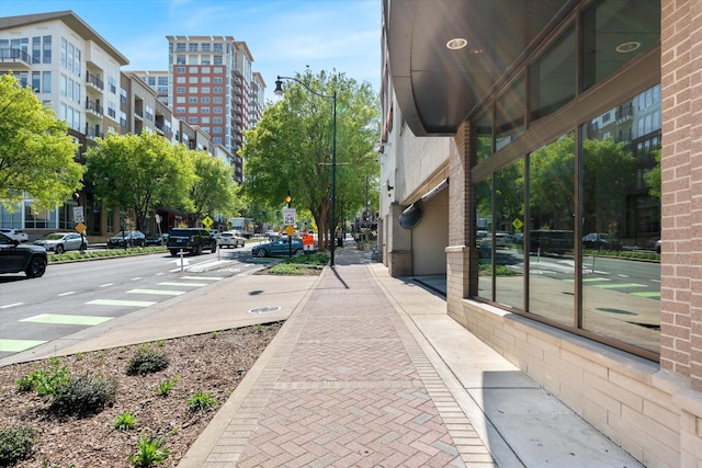 1510 Demonbreun St Unit 807, Nashville, TN 37203 - view of street with street lighting, traffic signs, curbs, and sidewalks