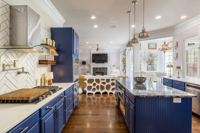 kitchen with crown molding and blue cabinets