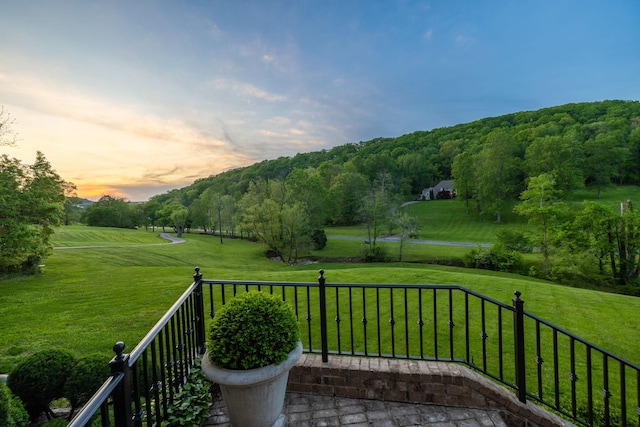 patio terrace at dusk with a yard