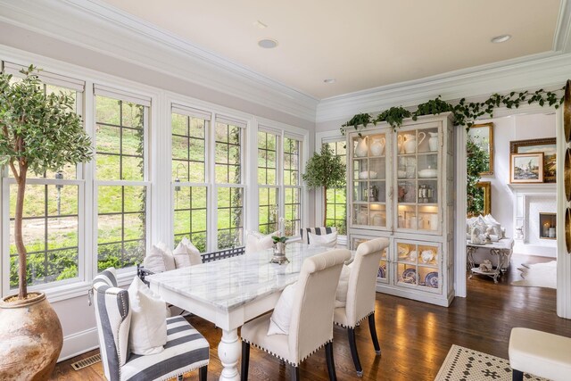 sunroom featuring french doors and visible vents