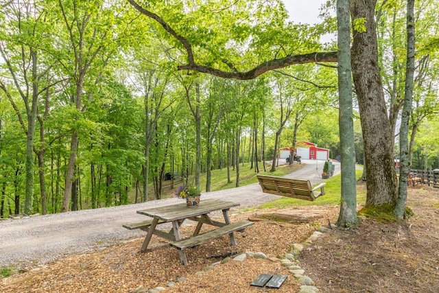 6498 Arno College Grove Rd, College Grove, TN 37046 - surrounding community featuring a view of trees and an outdoor structure