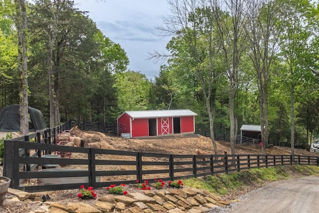 6498 Arno College Grove Rd, College Grove, TN 37046 - view of pole building with fence and a wooded view