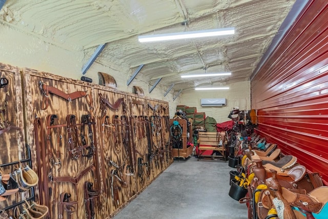 6498 Arno College Grove Rd, College Grove, TN 37046 - storage room with a garage and a wall mounted air conditioner