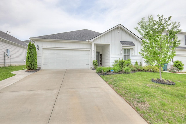 ranch-style house with board and batten siding, concrete driveway, a front yard, and a garage