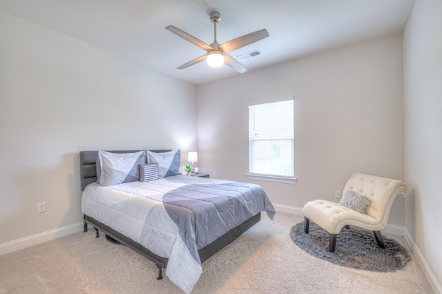 bedroom featuring carpet flooring, baseboards, visible vents, and ceiling fan