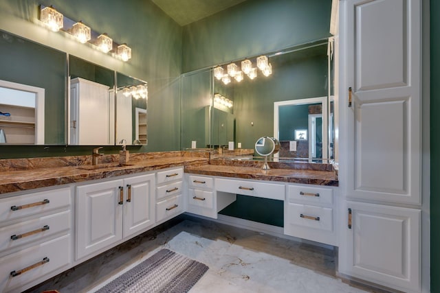 bathroom featuring vanity and marble finish floor