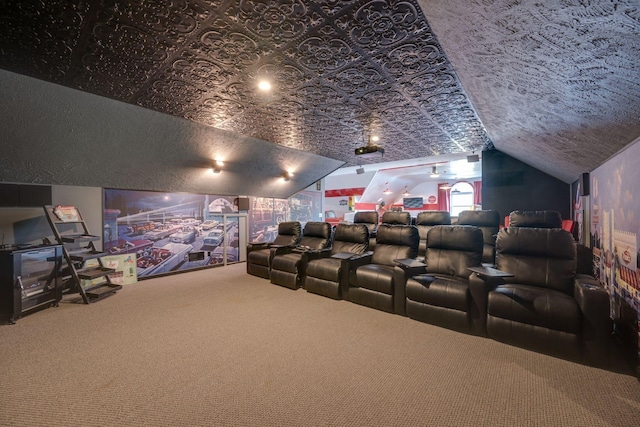 carpeted home theater room featuring vaulted ceiling