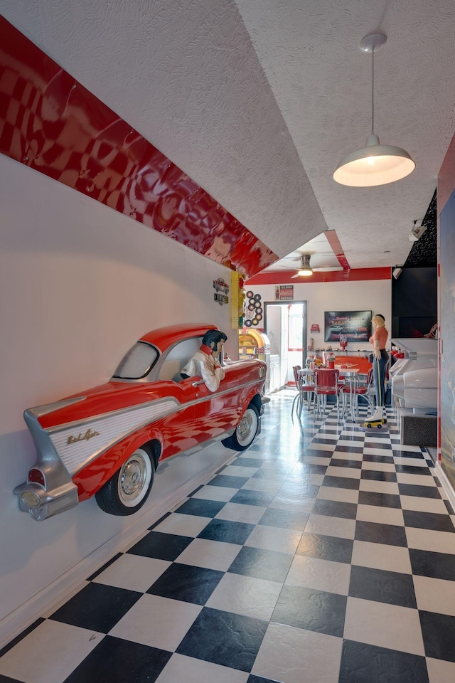garage featuring a ceiling fan