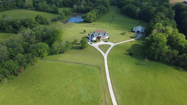 birds eye view of property featuring a rural view