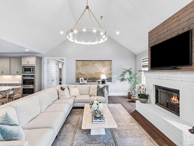 2025 Hornsby Dr, Franklin, TN 37064 - living area with dark wood-style flooring, a fireplace, high vaulted ceiling, recessed lighting, and baseboards