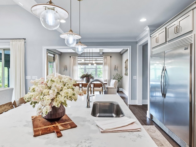 2025 Hornsby Dr, Franklin, TN 37064 - kitchen with decorative light fixtures, stainless steel built in fridge, light stone countertops, a sink, and recessed lighting
