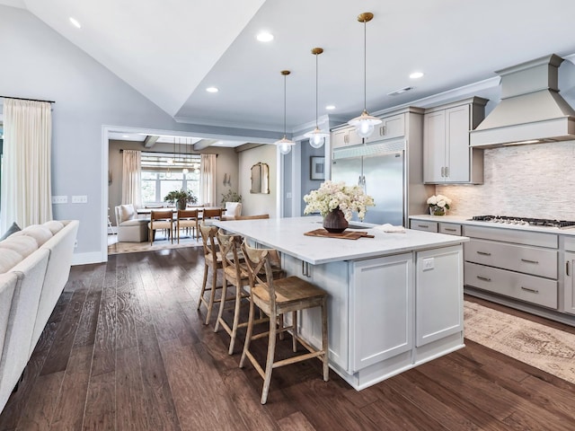 2025 Hornsby Dr, Franklin, TN 37064 - kitchen featuring appliances with stainless steel finishes, gray cabinets, a center island, open floor plan, and custom range hood