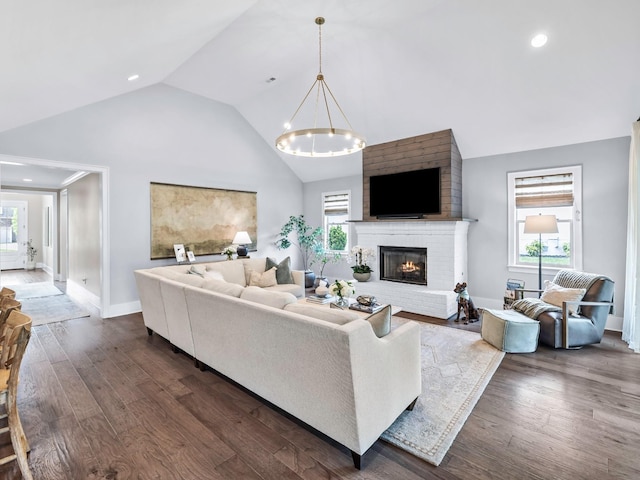 2025 Hornsby Dr, Franklin, TN 37064 - living room with an inviting chandelier, baseboards, a fireplace, and a healthy amount of sunlight
