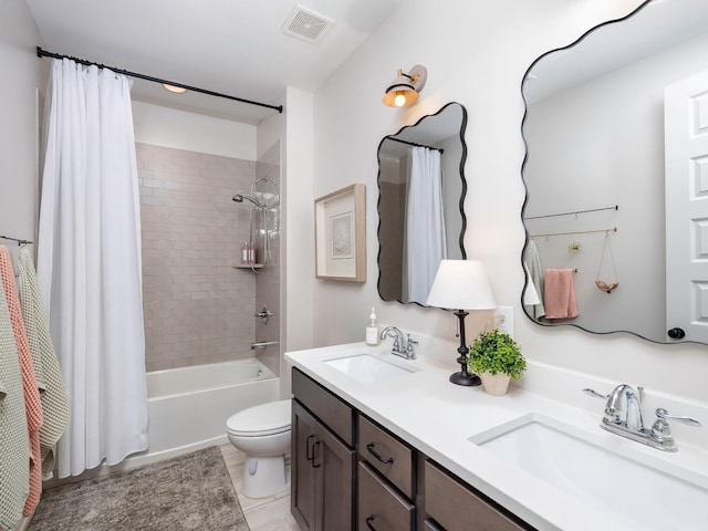 2025 Hornsby Dr, Franklin, TN 37064 - full bathroom with toilet, visible vents, a sink, and shower / tub combo