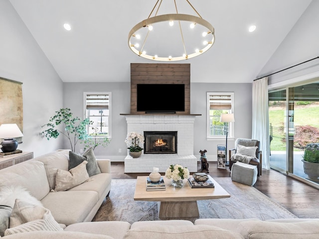 2025 Hornsby Dr, Franklin, TN 37064 - living area with a fireplace, wood finished floors, and high vaulted ceiling