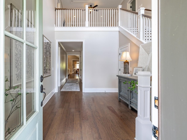 2025 Hornsby Dr, Franklin, TN 37064 - foyer with a towering ceiling, baseboards, ornamental molding, and dark wood-type flooring