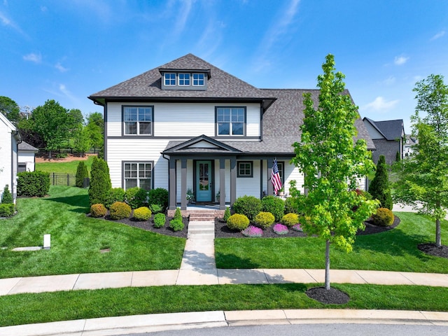 2025 Hornsby Dr, Franklin, TN 37064 - traditional style home featuring fence, roof with shingles, and a front lawn