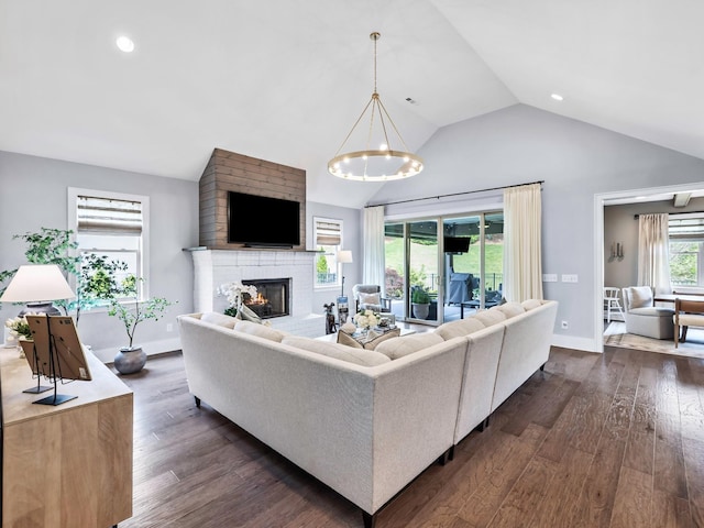 2025 Hornsby Dr, Franklin, TN 37064 - living area with dark wood-style flooring, high vaulted ceiling, a chandelier, and a fireplace
