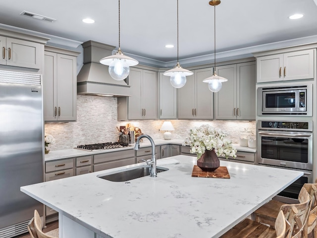 2025 Hornsby Dr, Franklin, TN 37064 - kitchen featuring visible vents, built in appliances, gray cabinets, custom range hood, and a sink
