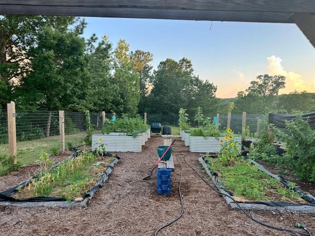 view of yard featuring a garden and fence