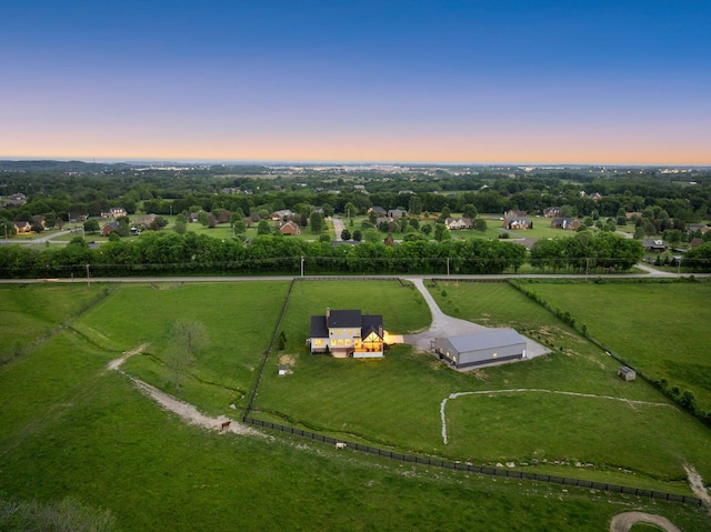 aerial view at dusk with a rural view