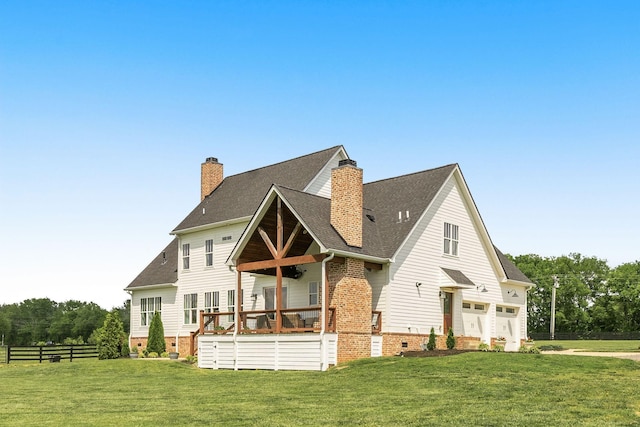 view of front of house with crawl space, fence, a front lawn, and a chimney