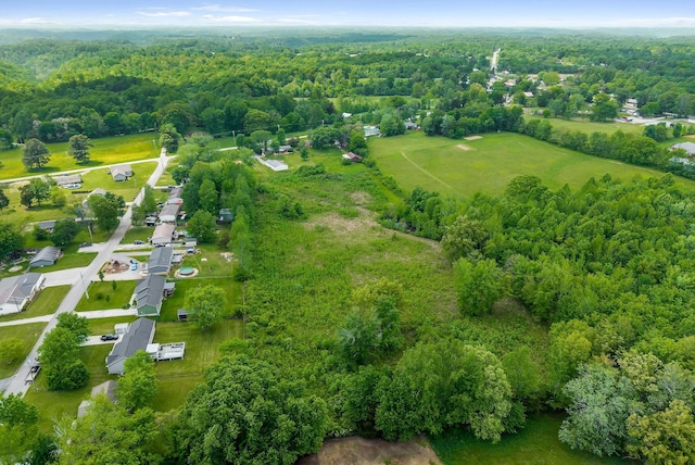 bird's eye view featuring a view of trees