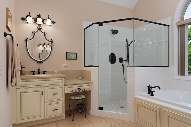 7237 River Run Dr, Chattanooga, TN 37416 - full bath featuring vanity, tile patterned flooring, a shower stall, and a garden tub