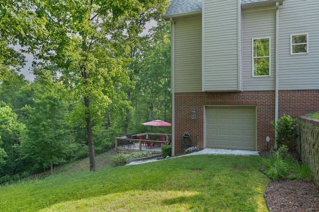 7237 River Run Dr, Chattanooga, TN 37416 - rear view of house featuring a lawn, a shingled roof, a garage, and brick siding