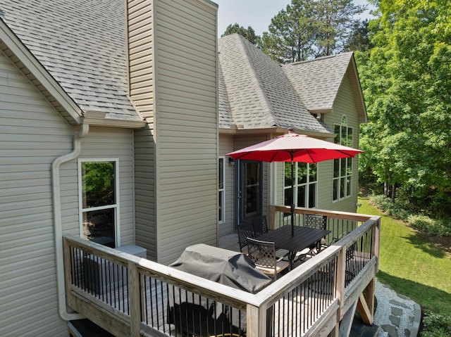7237 River Run Dr, Chattanooga, TN 37416 - rear view of house with a chimney, outdoor dining area, roof with shingles, and a wooden deck