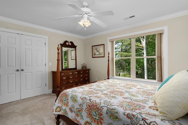 7237 River Run Dr, Chattanooga, TN 37416 - bedroom featuring visible vents, ornamental molding, a closet, light carpet, and ceiling fan
