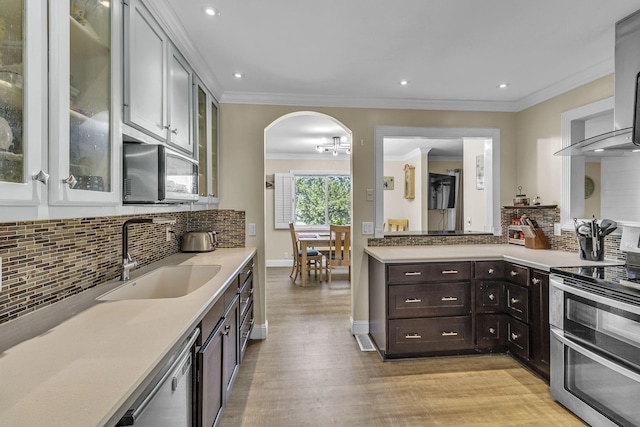 120 Tanasi Shr, Gallatin, TN 37066 - kitchen featuring a sink, appliances with stainless steel finishes, backsplash, and light countertops