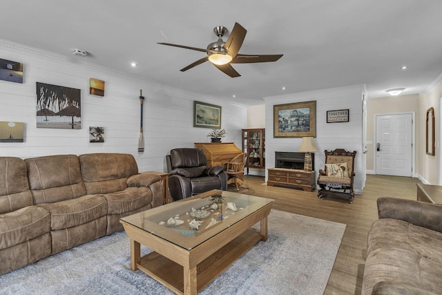 120 Tanasi Shr, Gallatin, TN 37066 - living area featuring crown molding, wood finished floors, ceiling fan, wooden walls, and recessed lighting