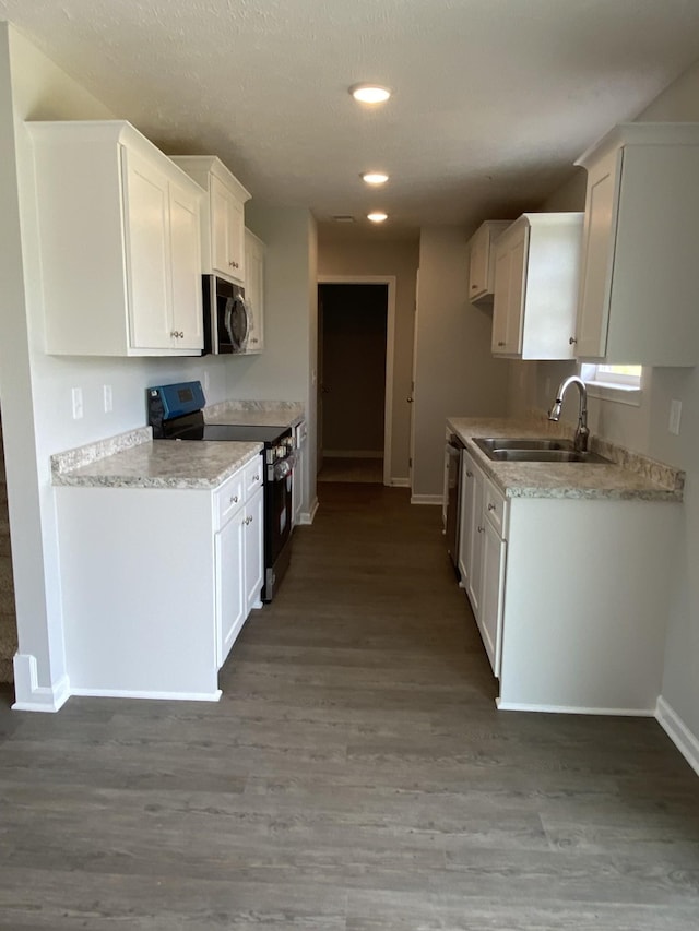 1110 Merritt Hill Trl, Smyrna, TN 37167 - kitchen with baseboards, a sink, white cabinetry, and appliances with stainless steel finishes