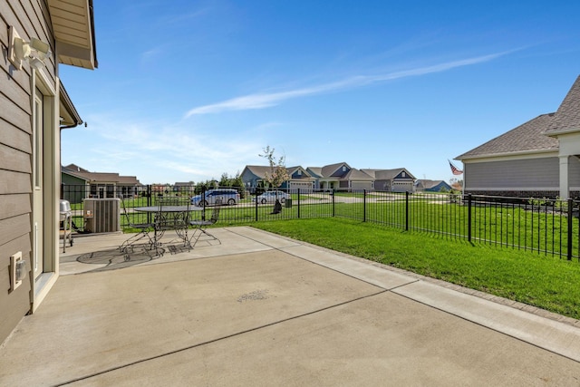 1235 Del Webb Blvd, Spring Hill, TN 37174 - view of patio with central air condition unit, fence, and a residential view