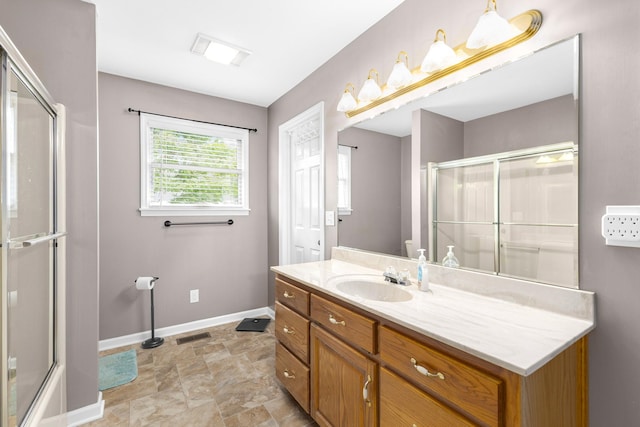 140 Keele Rd, Manchester, TN 37355 - full bathroom featuring an enclosed shower, baseboards, vanity, and stone finish flooring
