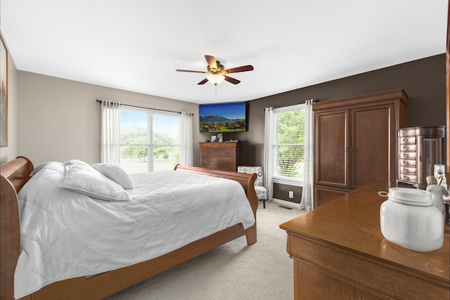 140 Keele Rd, Manchester, TN 37355 - bedroom with light carpet, ceiling fan, and baseboards