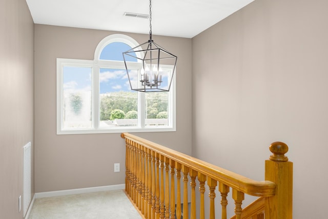 140 Keele Rd, Manchester, TN 37355 - stairway with a chandelier, carpet flooring, and baseboards