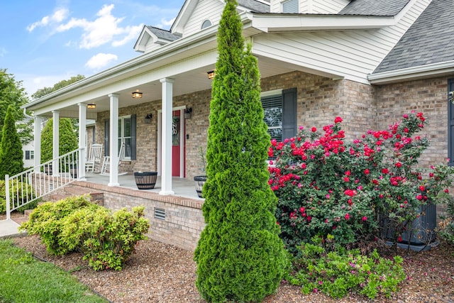 140 Keele Rd, Manchester, TN 37355 - entrance to property with a porch, brick siding, and a shingled roof