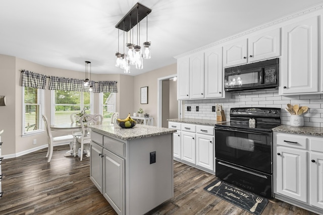 140 Keele Rd, Manchester, TN 37355 - kitchen with black appliances, backsplash, a center island, dark wood-style flooring, and white cabinetry