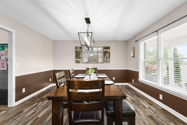 140 Keele Rd, Manchester, TN 37355 - dining room with wood finished floors, a chandelier, and baseboards