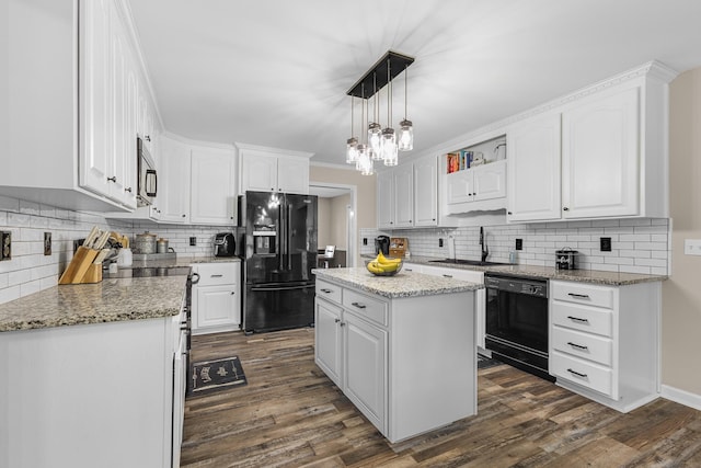 140 Keele Rd, Manchester, TN 37355 - kitchen featuring black appliances, backsplash, white cabinets, and dark wood-style flooring