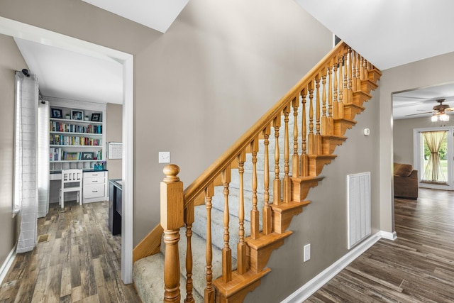140 Keele Rd, Manchester, TN 37355 - stairs featuring wood finished floors, ceiling fan, and baseboards